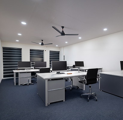 Modern coworking spaces in M G Road, Kochi with shared desks and collaborative workspace.