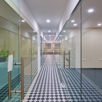 Well-lit coworking area suitable for companies operating in Ernakulam