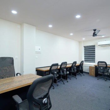 Modern office interior with desks and meeting space in Ernakulam