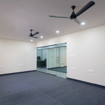 Professional workspace setup inside a commercial office in Ernakulam.